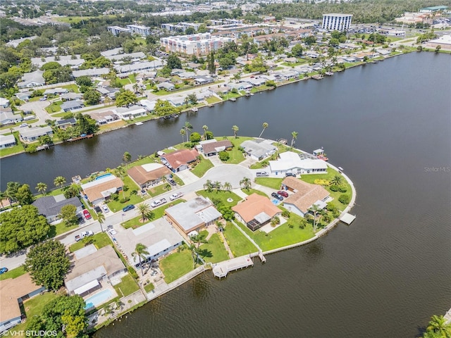 aerial view with a water view and a residential view