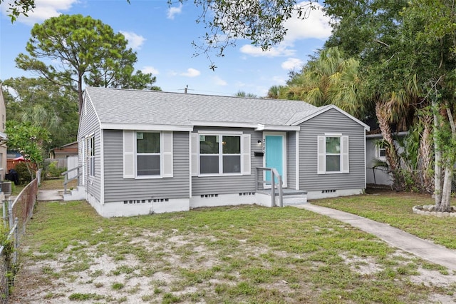 view of front of house with a front lawn