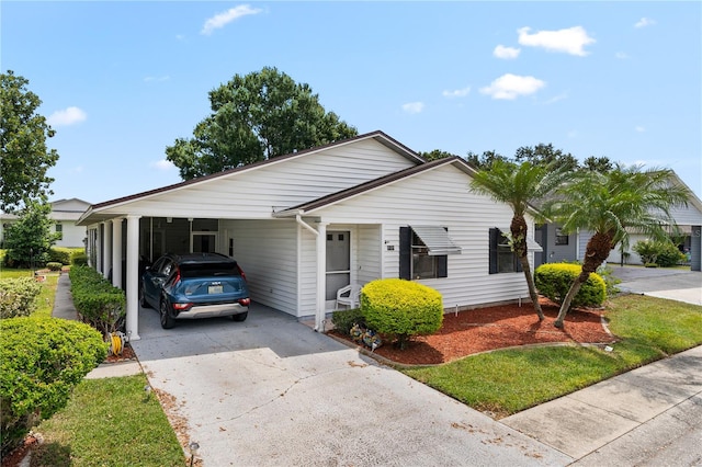 view of front of house featuring a carport