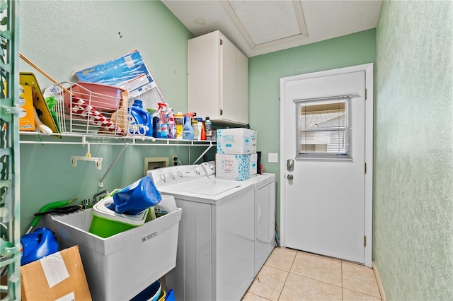 1967 Long Boat Dr, Lakeland, FL 33810 - washroom featuring light tile patterned flooring, cabinet space, a sink, and washer and clothes dryer