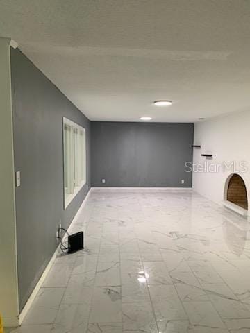 empty room featuring tile patterned flooring