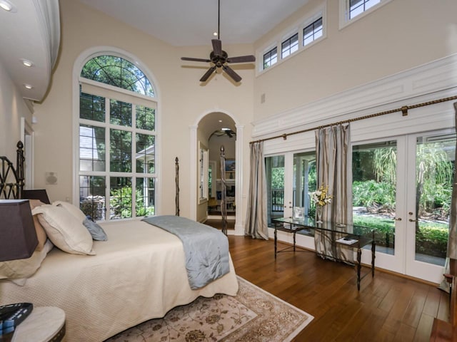 2901 Leprechaun Ln, Palm Harbor, FL 34683 - bedroom with arched walkways, access to outside, and french doors