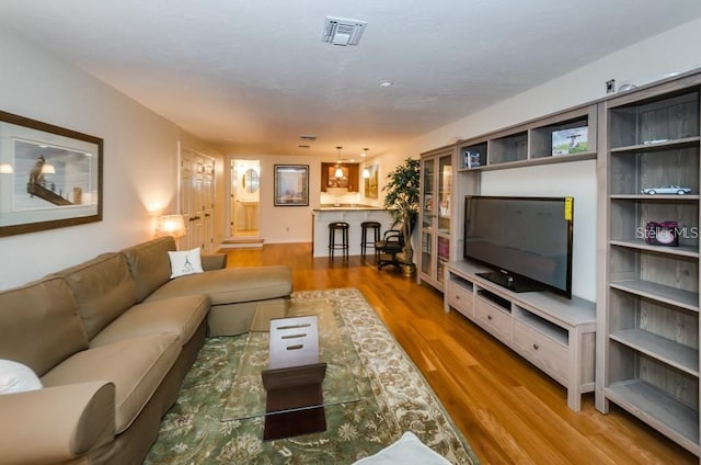 living room with wood-type flooring