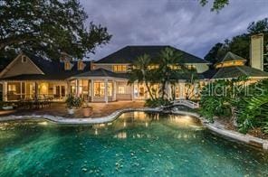 2901 Leprechaun Ln, Palm Harbor, FL 34683 - outdoor pool with a patio area