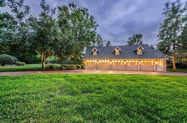 2901 Leprechaun Ln, Palm Harbor, FL 34683 - country-style home featuring a garage, a front lawn, and driveway