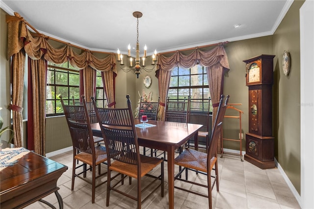 dining room featuring ornamental molding, a wealth of natural light, an inviting chandelier, and light tile patterned flooring