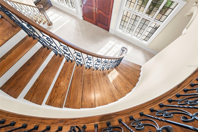 staircase with tile patterned flooring