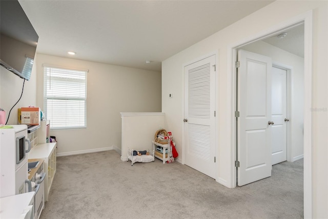 playroom with light carpet