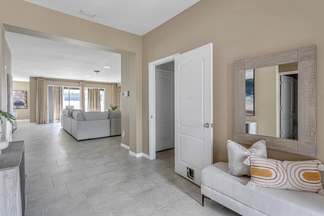 living room featuring light tile patterned floors