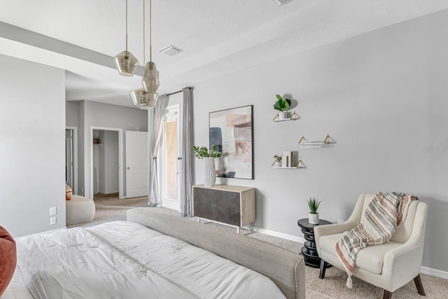 bedroom featuring light carpet