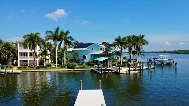 dock area with a water view