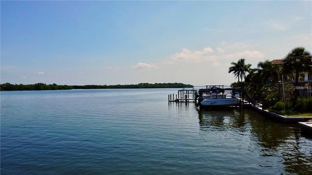 view of dock with a water view