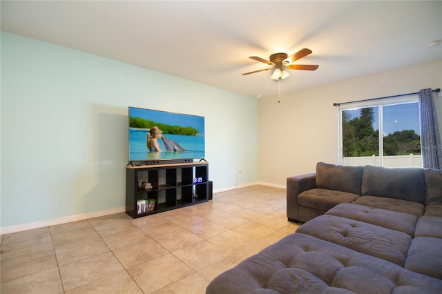 living room featuring ceiling fan and light tile patterned floors