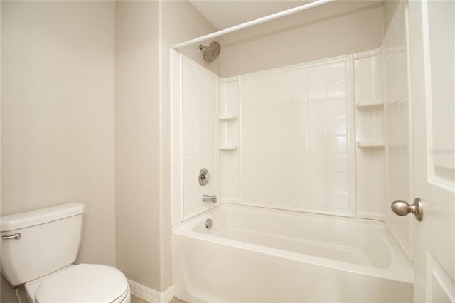 bathroom with toilet and shower / bath combination