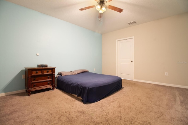 carpeted bedroom featuring ceiling fan