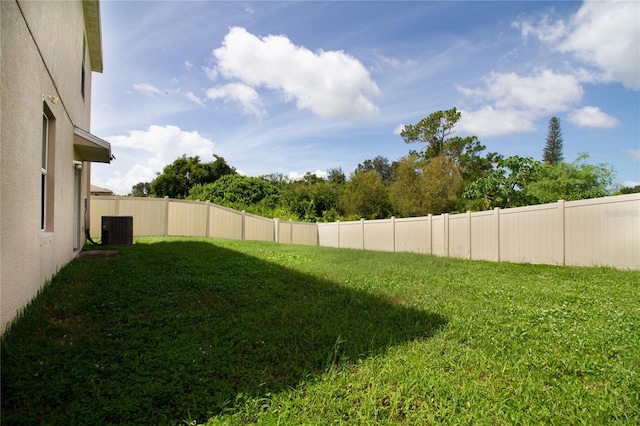 view of yard featuring central AC unit