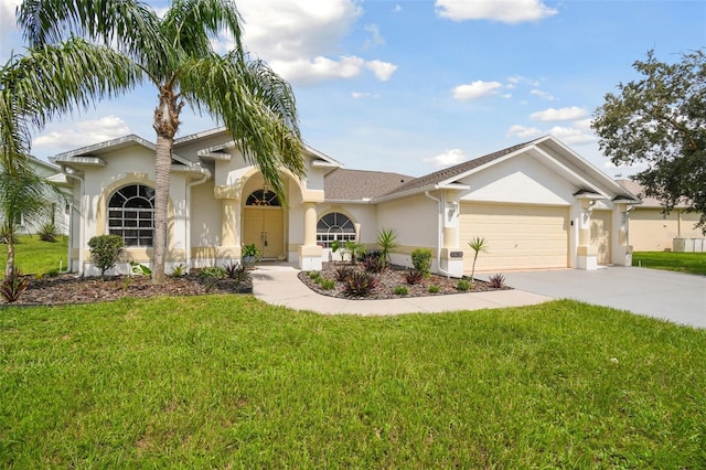 view of front facade featuring a garage and a front yard