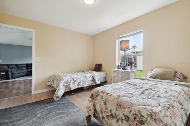 bedroom with hardwood / wood-style flooring