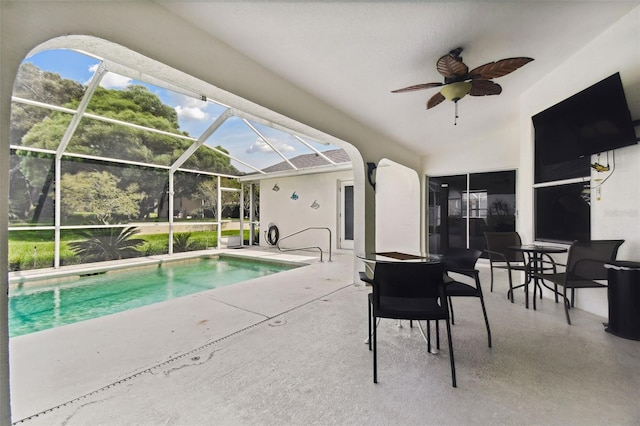 view of pool featuring a patio, a lanai, and ceiling fan