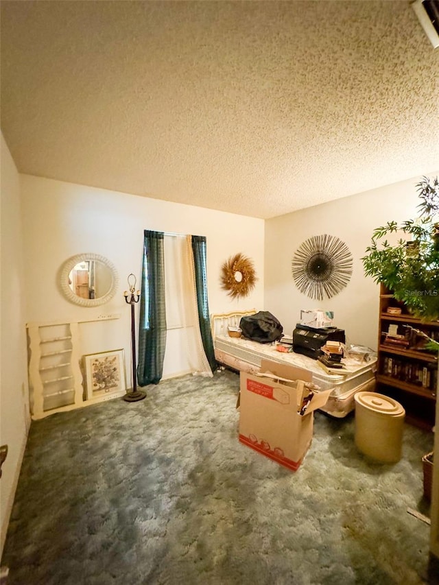 interior space featuring a textured ceiling