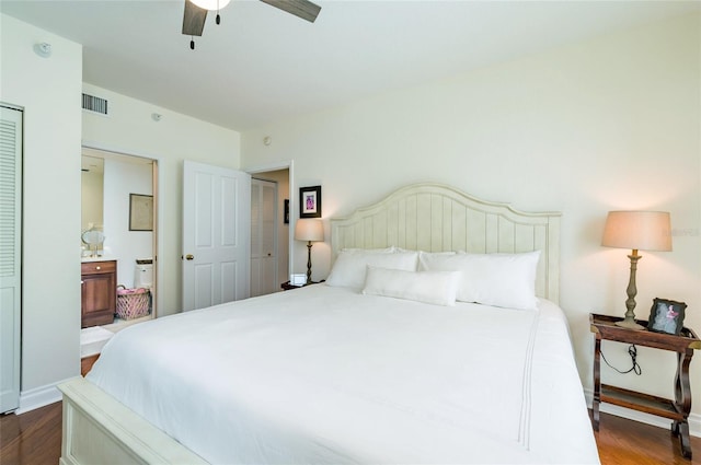 bedroom with ceiling fan, a closet, and hardwood / wood-style flooring