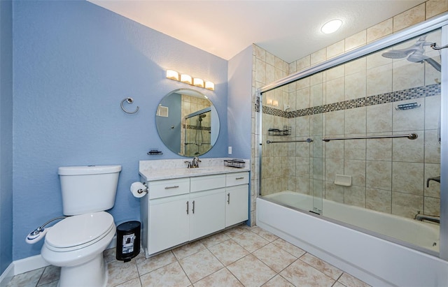 full bathroom featuring toilet, tile patterned floors, shower / bath combination with glass door, and vanity