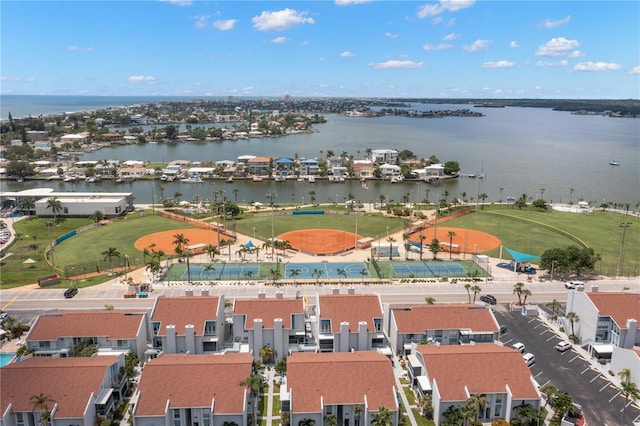 birds eye view of property with a water view