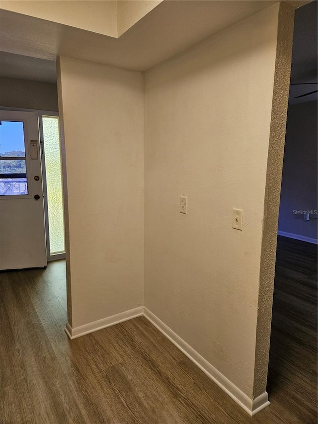 hallway featuring hardwood / wood-style floors