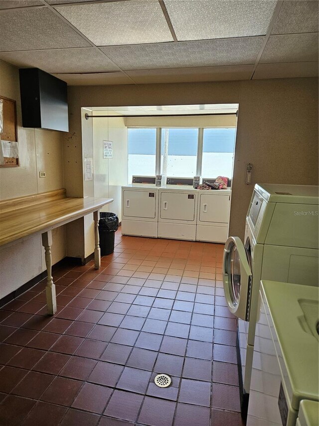 washroom featuring independent washer and dryer and tile patterned floors