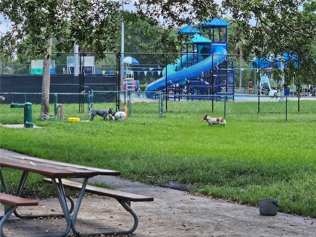 view of play area featuring a lawn