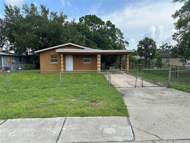 ranch-style house with a front yard and a carport