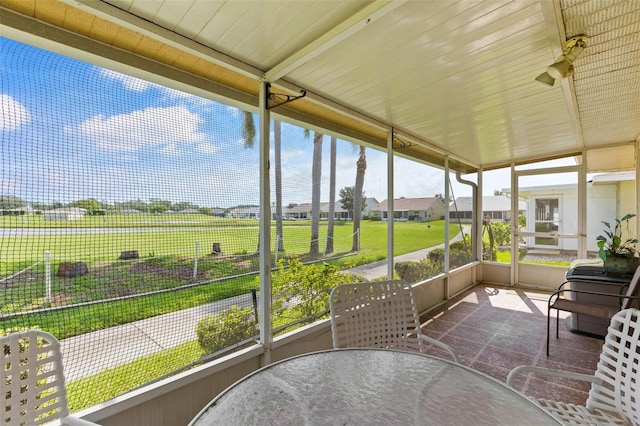 sunroom featuring plenty of natural light