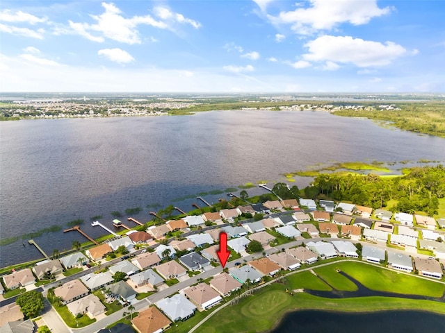 birds eye view of property featuring a water view