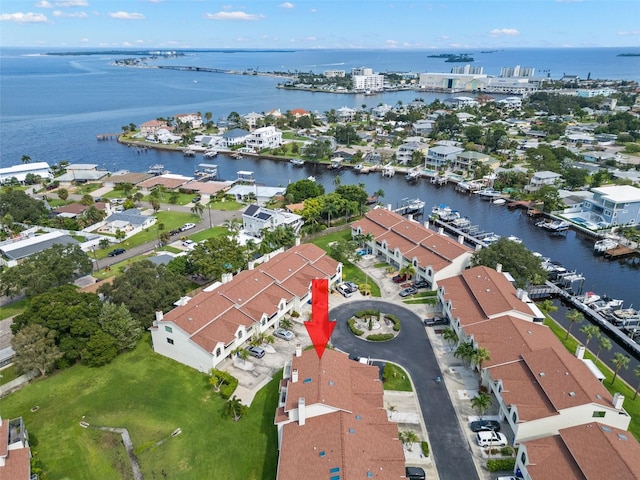 aerial view featuring a water view and a residential view