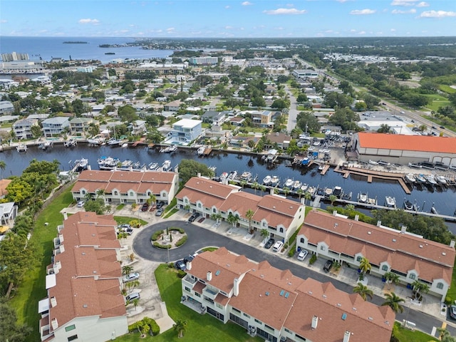 bird's eye view with a water view and a residential view