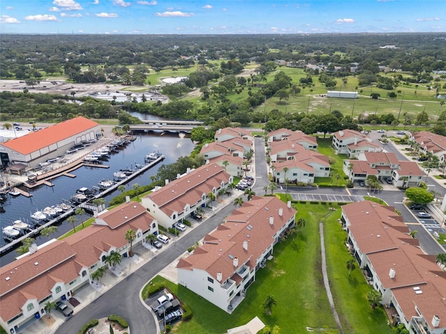 aerial view with a water view and a residential view