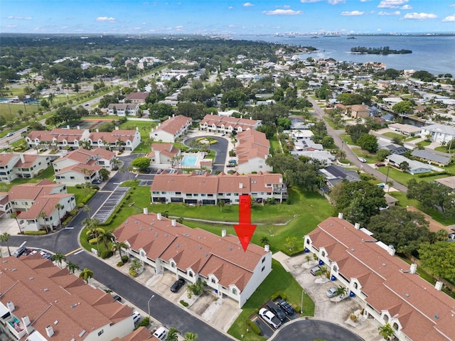 bird's eye view with a water view and a residential view