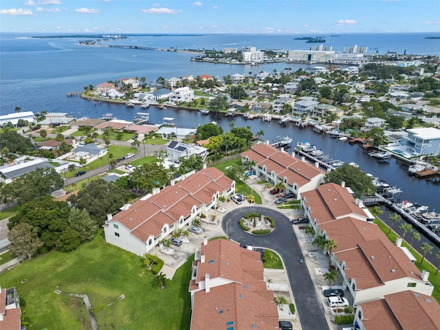 birds eye view of property featuring a residential view and a water view