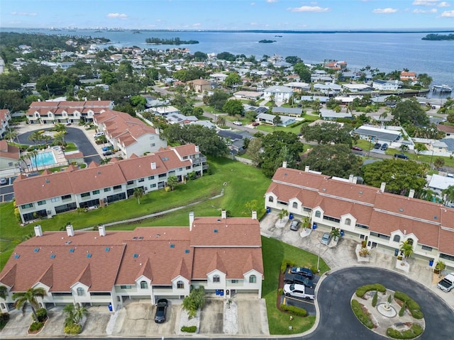 bird's eye view with a residential view and a water view