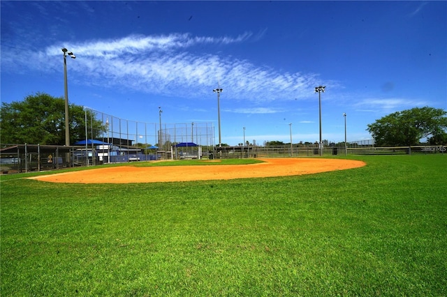 view of home's community featuring a lawn