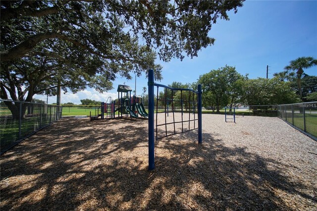 surrounding community featuring a playground