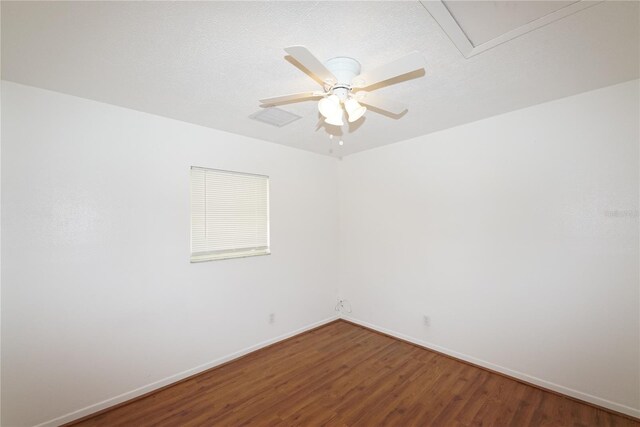 unfurnished room with ceiling fan and wood-type flooring