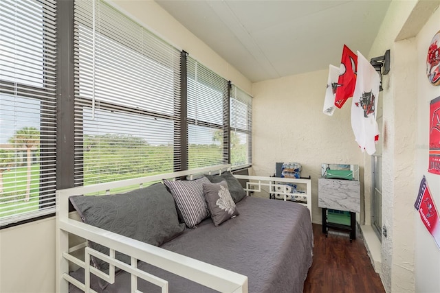 bedroom with hardwood / wood-style flooring