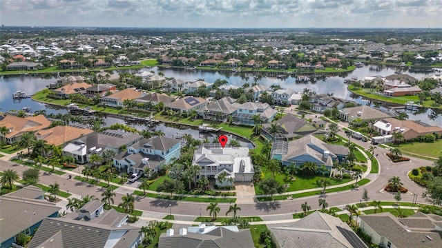 drone / aerial view featuring a water view