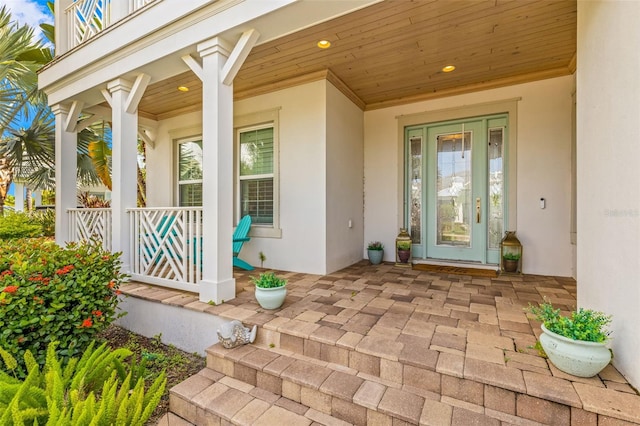 doorway to property with a porch