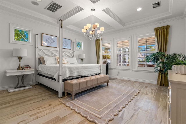 bedroom featuring coffered ceiling, crown molding, a chandelier, and light hardwood / wood-style floors