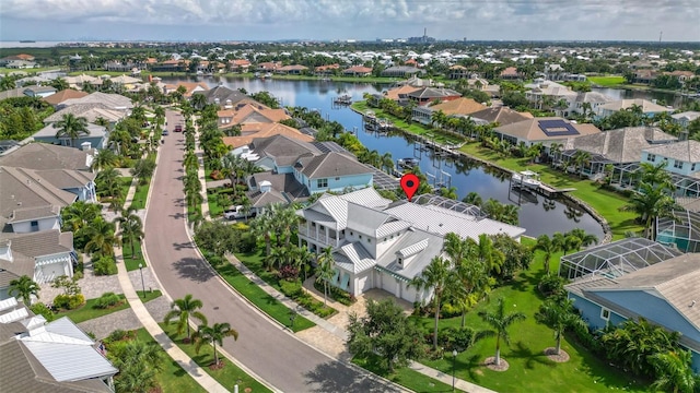 drone / aerial view with a water view