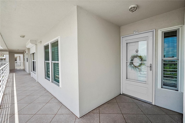 property entrance with a balcony