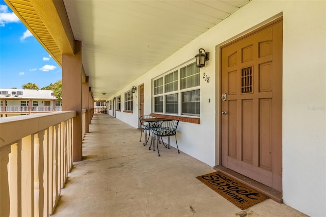 entrance to property featuring a porch