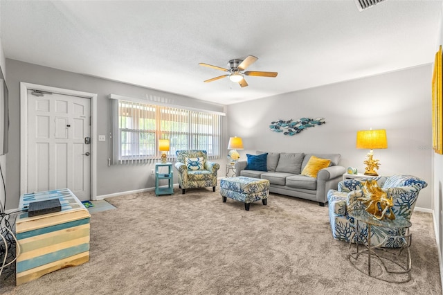 living room featuring ceiling fan and carpet flooring